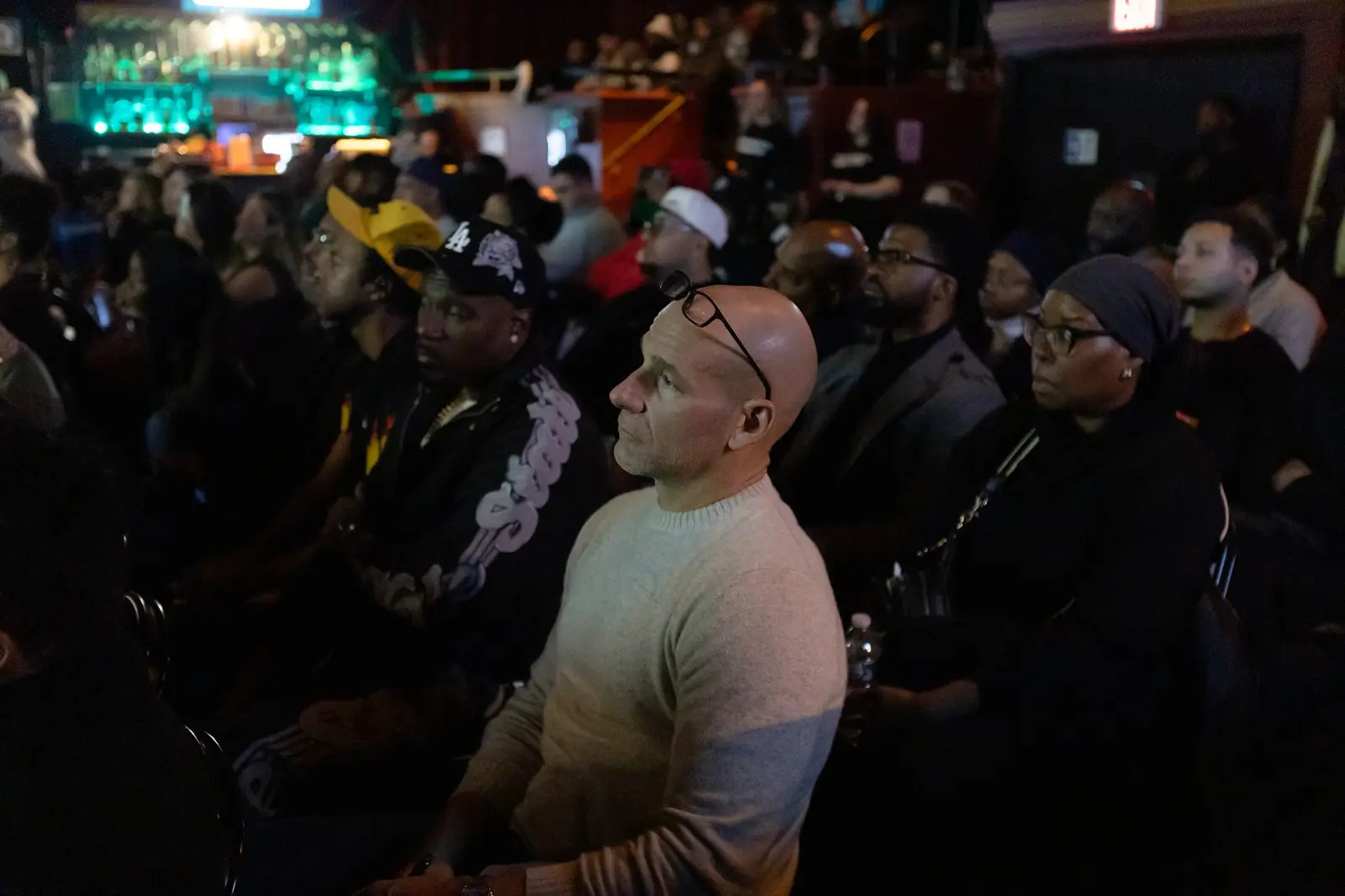 An audience member listening intently during a session at a previous event