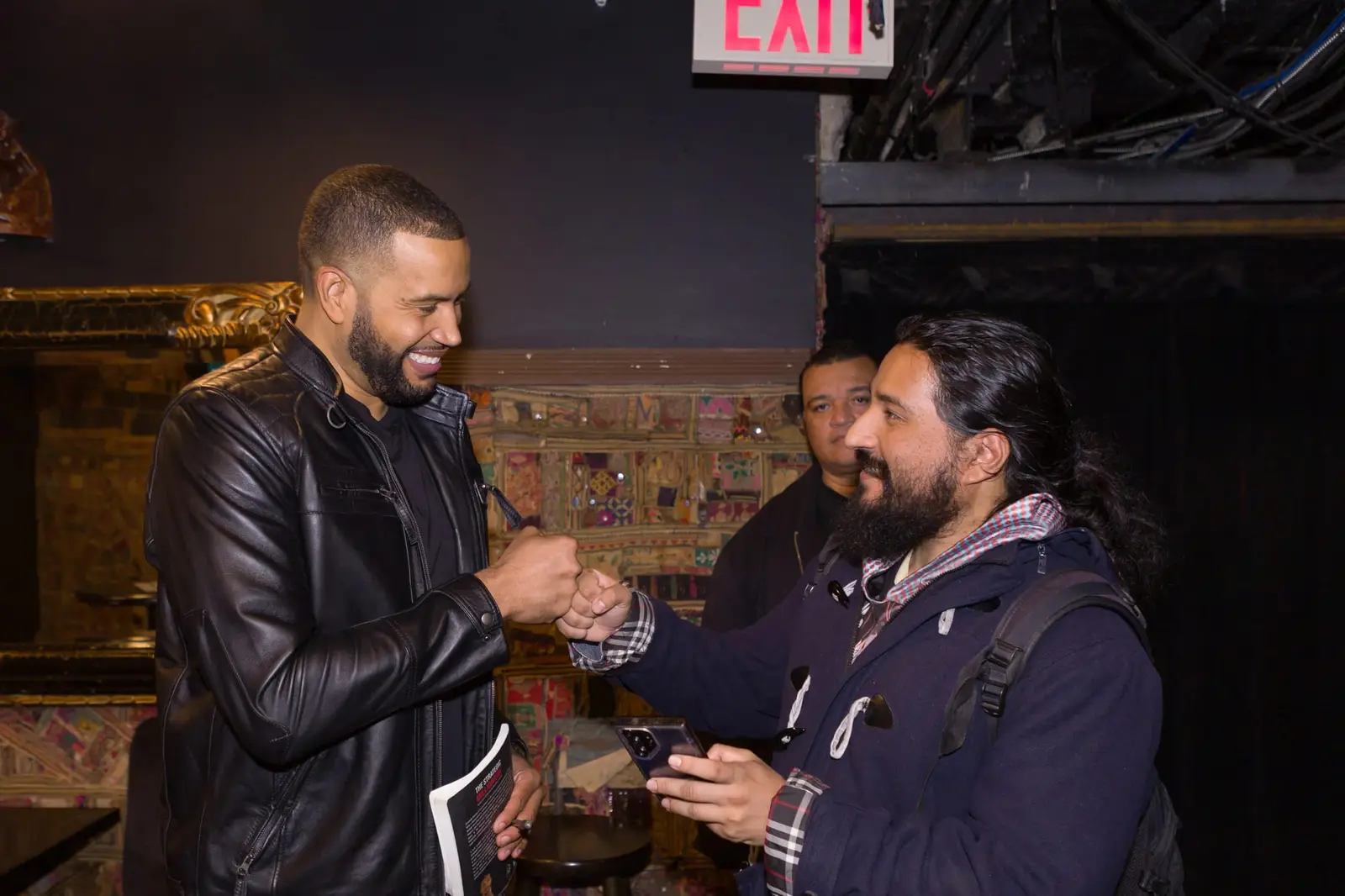 Armando Pantoja shaking hands with an attendee after a session at a previous event