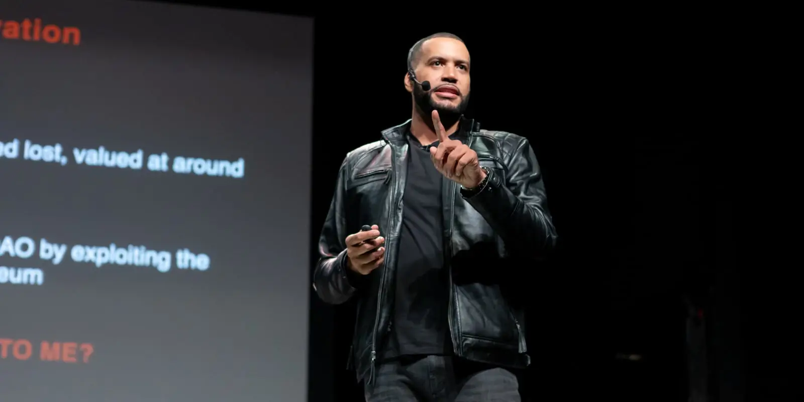 Armando Pantoja making a point on stage at a previous event