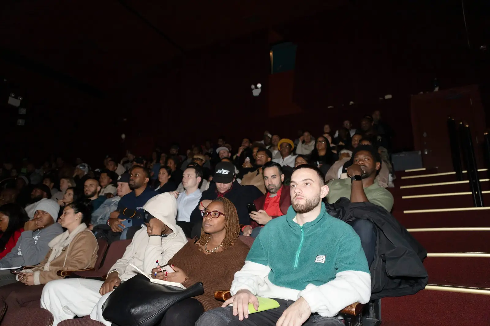 An attentive audience in their seats at a previous event